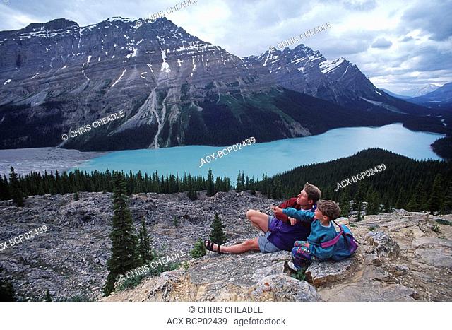 Peyto Lake between Banff and Jasper, father and son at lookout, Alberta, Canada
