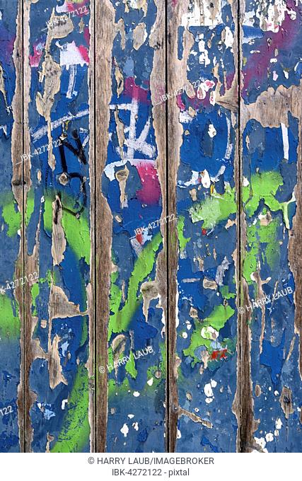 Flaked colorful paint on wooden boards, Baden-Württemberg, Germany