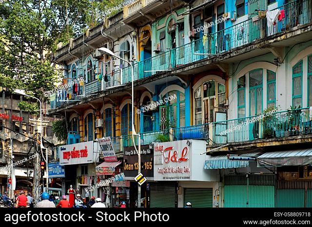 HO CHI MINH CITY, VIET NAM- APRIL 18, 2017: Scene of old apartment building at Cho Lon on day, amazing ancient architecture of China town, Vietnam