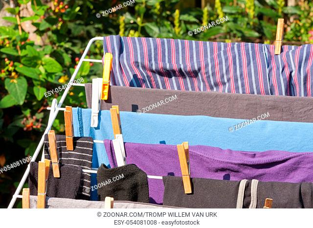 Drying frame with clothes in the garden