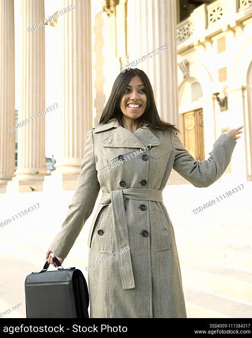 Indian businesswoman in front of building