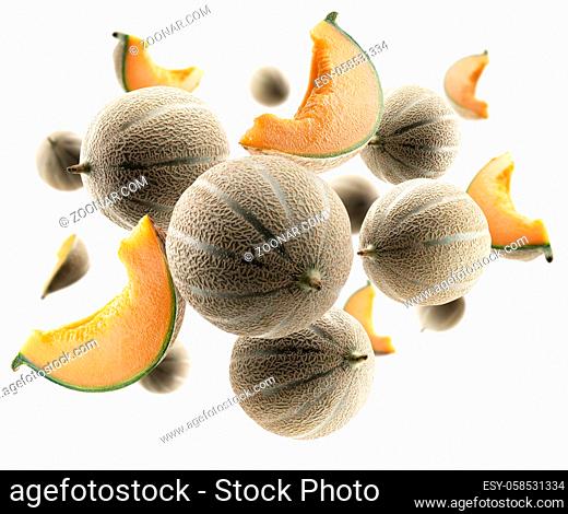 Whole and slices of melon levitate on a white background