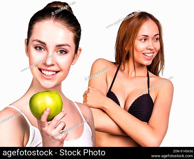 Young healthy woman with apple and perfect body isolated on white. Healthy eating concept