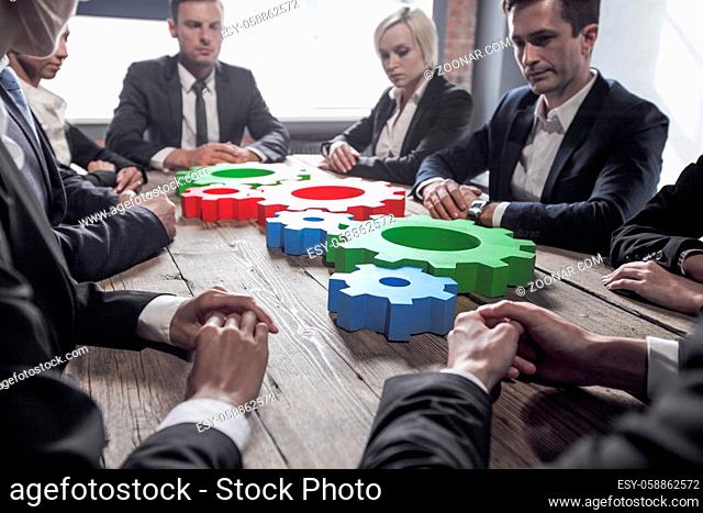 Business people with colorful cogs of business, problem sloution concept