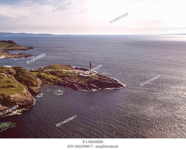 Stunning aerial shot of Ardnamurchan Point, Great Britains most westerly point, with lighthouse and the beautiful white beaches and costline in the background