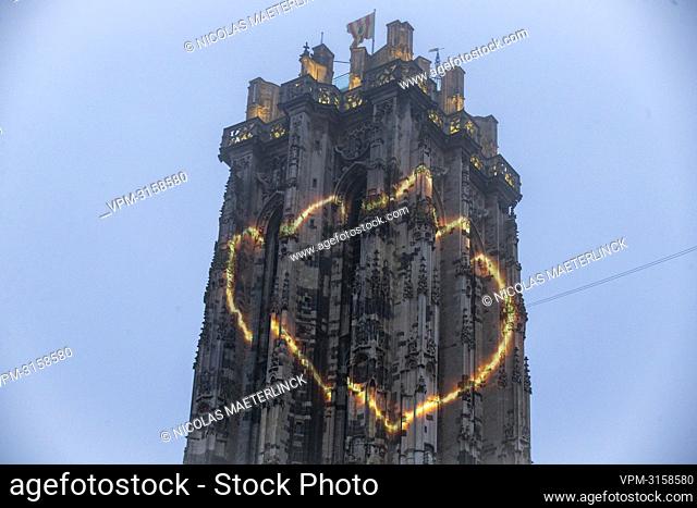 Illustration picture shows a flame projected on the Sint-Romboutstoren - Saint Rumbold's tower of the cathedral, during an event to mark the start of the...