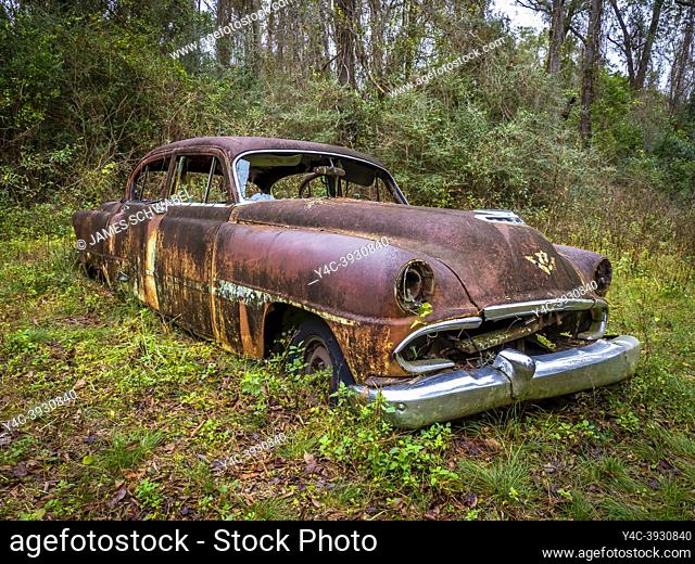 Old rusted abandoned cars in Crawfordville Florida