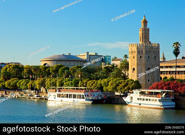 cityscape of Seville with Golden Tower (Torre del Oro), Spain