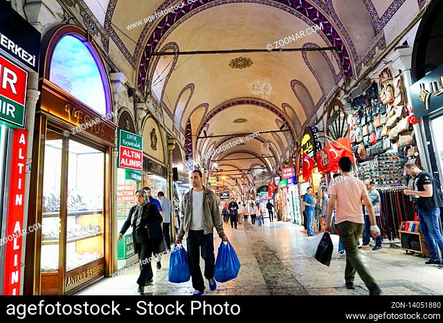 Istanbul, Istanbul Province / Turkey: 18 April, 2016: many people pass through the Kapali Carsi indoor bazaar in Instanbul and do their shopping