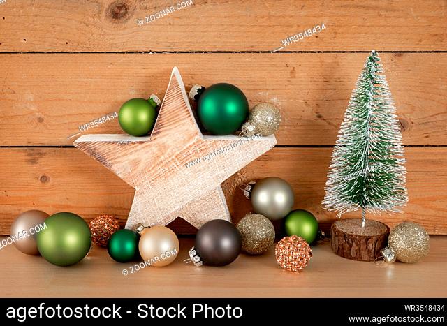 Christmas decoration glass balls with wooden star and fir tree