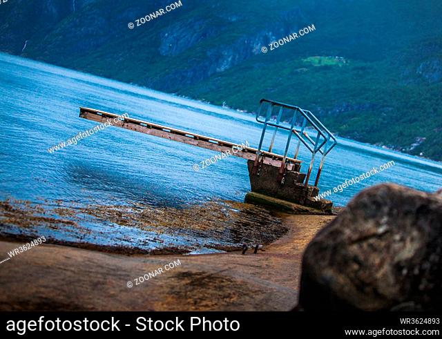 diving board at a misty fjord
