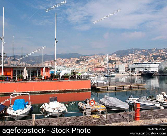 GENOA, ITALY - MARCH 16, 2014: Since the construction of the new harbour for merchant ships, the old harbour called Porto Vecchio is still in use for cruise...