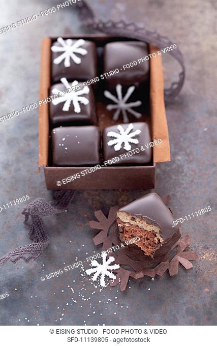 A box of Dominosteine (chocolate covered sweets with marzipan and gingerbread)