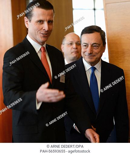 The president of the European Central Bank (ECB), Mario Draghi (r) and professor for European Macroeconomics Guenter W. Beck arrive for the the conference 'The...