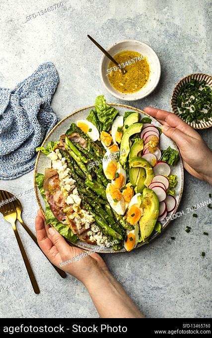 Asparagus Cobb Salad - Roman salad, grilled asparagus, bacon, gorgonzola cheese, boiled eggs, chives, radish