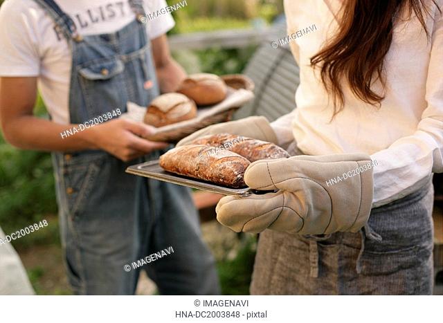 A couple baking home-made bread