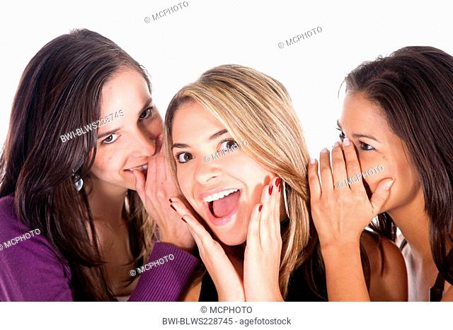 three young women gossiping