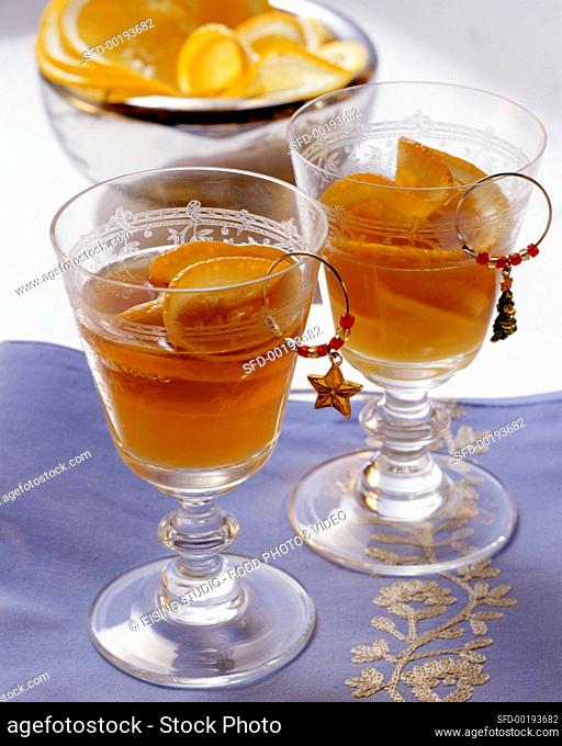 Two sherry cocktails with orange as aperitif