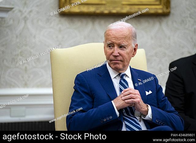United States President Joe Biden while meeting with President Joko Widodo of Indonesia, in the Oval Office of the White House in Washington, DC, US, on Monday