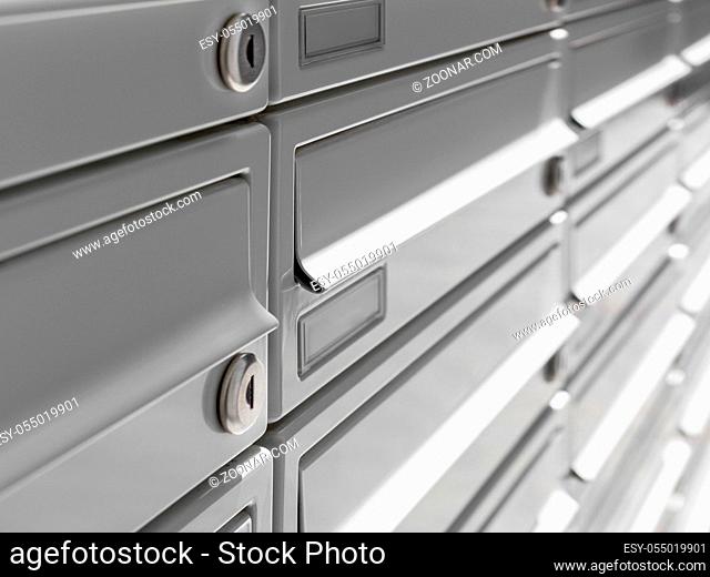 Modern Gray Mailboxes. They can be used for background and concepts. Shallow depth of field
