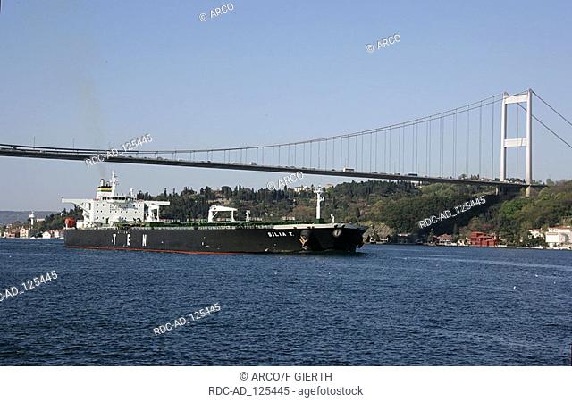 Freighter on Bosporus Ataturk bridge Istanbul Turkey