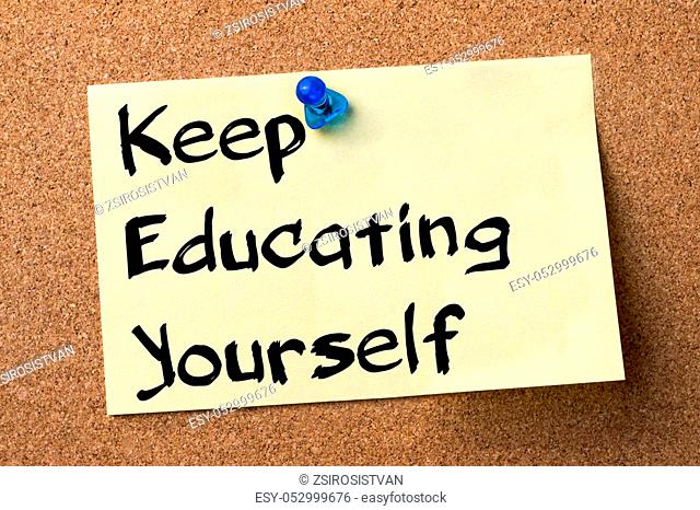 Keep Educating Yourself (KEY) - adhesive label pinned on bulletin board - horizontal image