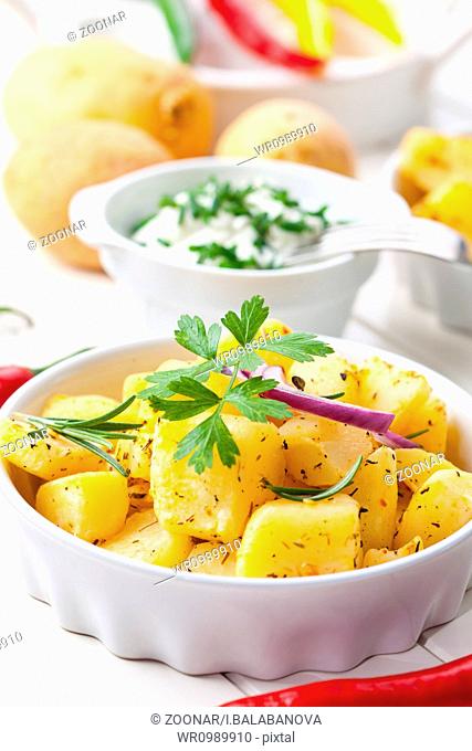 Delicious baked potatoes with sour cream