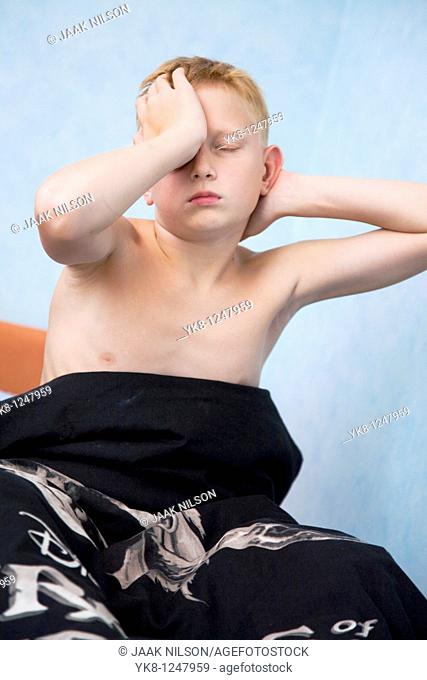 Teenage Boy Stretching After Sleeping