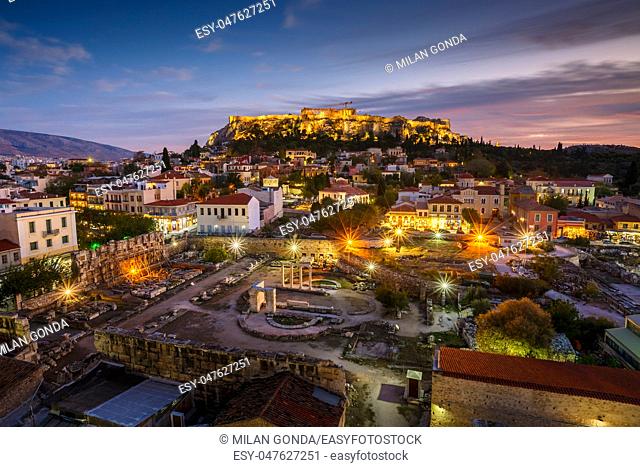View of Acropolis from a roof top coctail bar at sunset, Greece.