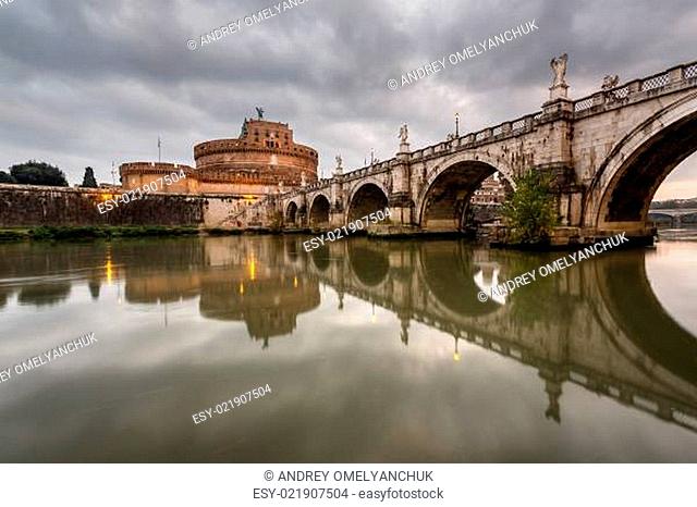 Castle of Holy Angel and Holy Angel Bridge over the Tiber River in Rome at Dawn, Italy