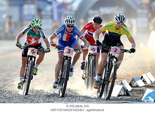 (L-R) Swiss cyclist Ramona Forchini, Czech Barbora Prudkova and Alexandra Engen of Sweden competes in the women's cross country sprint race - semifinal at...