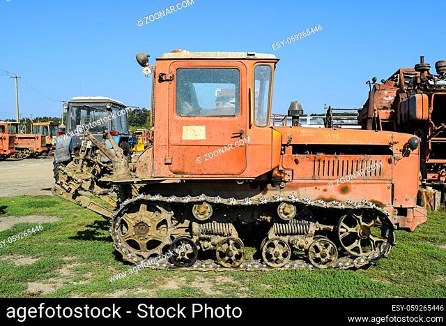 Russia, Temryuk - 15 July 2015: Tractor. Agricultural machinery tractor. Parking of tractor agricultural machinery. The picture was taken at a parking lot of...