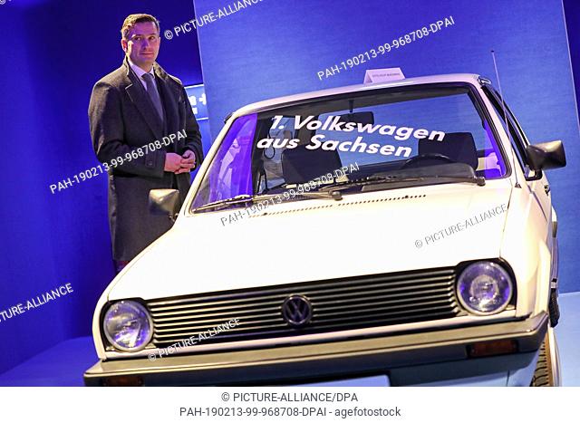 13 February 2019, Saxony, Zwickau: Martin Dulig, Minister of Economics of Saxony (SPD), stands next to a VW Polo in the Horch Museum