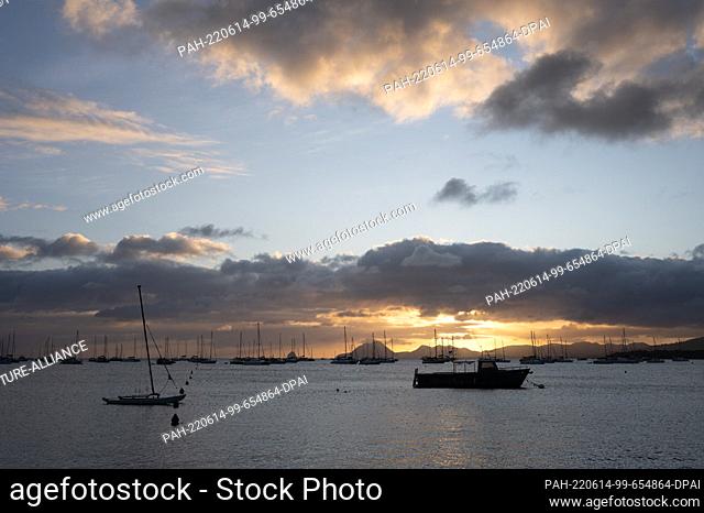 02 May 2022, France, Sainte-Anne: Boats silhouetted in a book at sunset. Photo: Sebastian Kahnert/dpa. - Sainte-Anne/Martinique/France