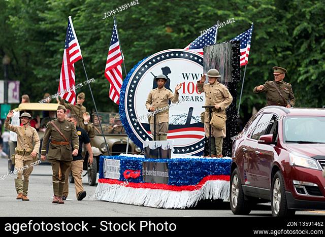 Washington, D.C., USA - May 28, 2018: The National Memorial Day Parade, Men dress up in world war one service men uniforms, going down constitution avenue
