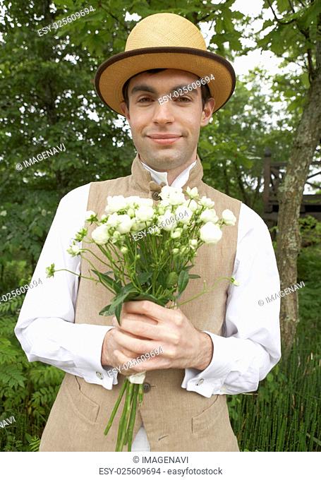 Groom holding a bouquet