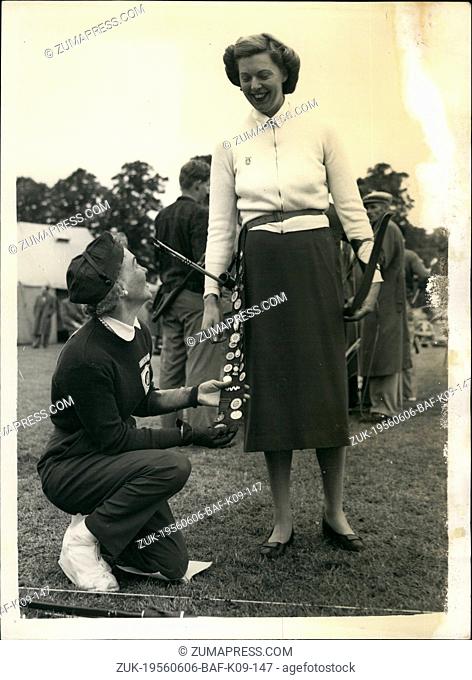 Jun. 06, 1956 - International Archery Tournament. Admiring Collection of Badges. The international Tournament of the Grand National Archery Society - opened...