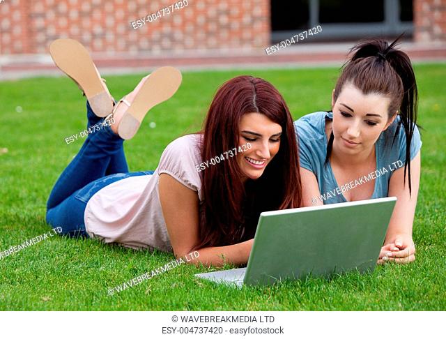Friends using a laptop
