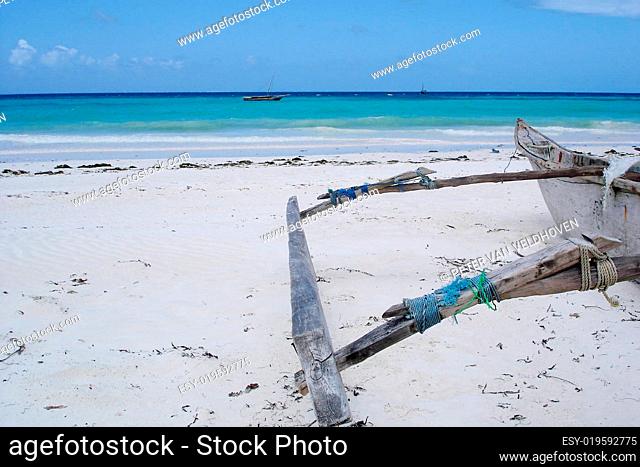 Old dhow on a beach on Zanzibar