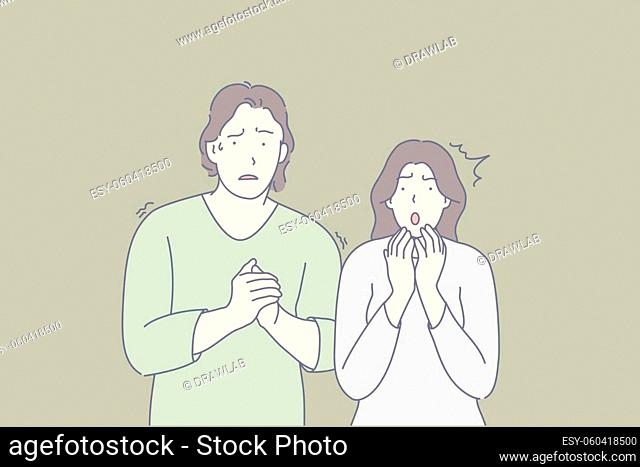 Frightened people, scared couple, shocked friends concept. Man and woman trembling with fear. Nervous guy sweating, clasping hands
