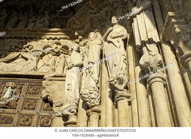 The Tui Cathedral artistical door, with ancient characters, Tui, Pontevedra, Galicia, Spain