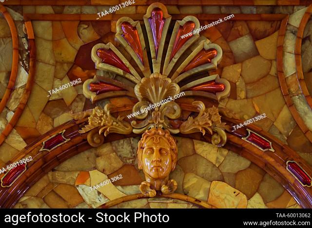 RUSSIA, ST PETERSBURG - MAY 19, 2023: Detail of the interior of the Amber Room in the Catherine Palace in Tsarskoye Selo