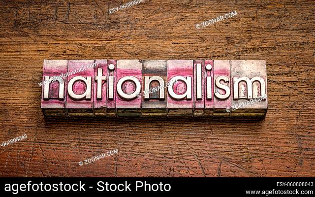 nationalism word abstract in gritty vintage letterpress metal types, political and social concept