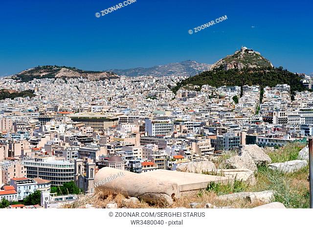 Athens Greece - April 27, 2016: Famous view from Acropolis to modern city with Lycabettus hill at background