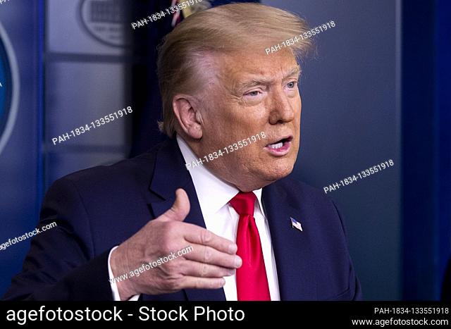 United States President Donald J. Trump participates in a news conference on jobs figures, in the James Brady Press Briefing Room of the White House in...