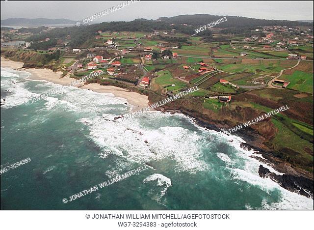 SPAIN Near Punta Faglida -- 15/12/2002 -- Aerial view of a polluted beach near Punta Faglida on the Galician coast. Thousands of volunteers and military...