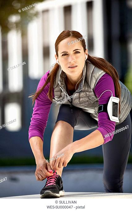 Athletic brunette woman outdoors