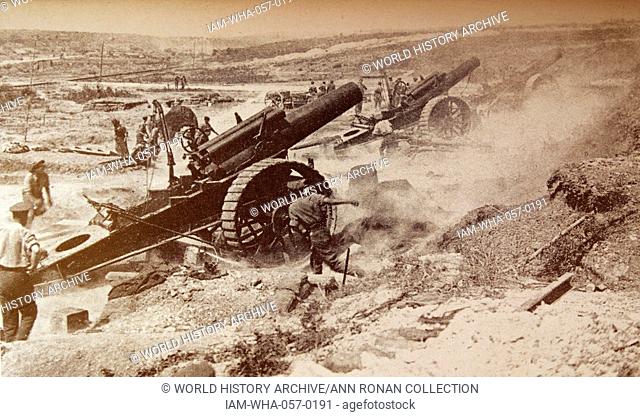In the 1914-18 war, armament grew bigger and more destructive. Eight-inch howitzers fire a barrage during the Battle of the Somme in August 1916