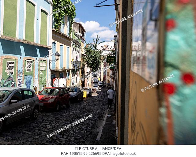 29 April 2019, Brazil, Salvador Da Bahia: People walk through the old town of Pelourinho in Salvador, a UNESCO World Heritage Site
