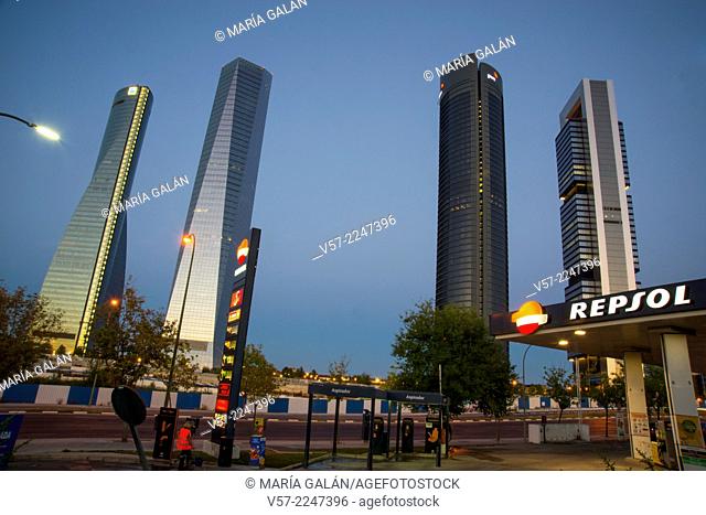 Four Towers Business Area from a gas station, night view. Madrid, Spain